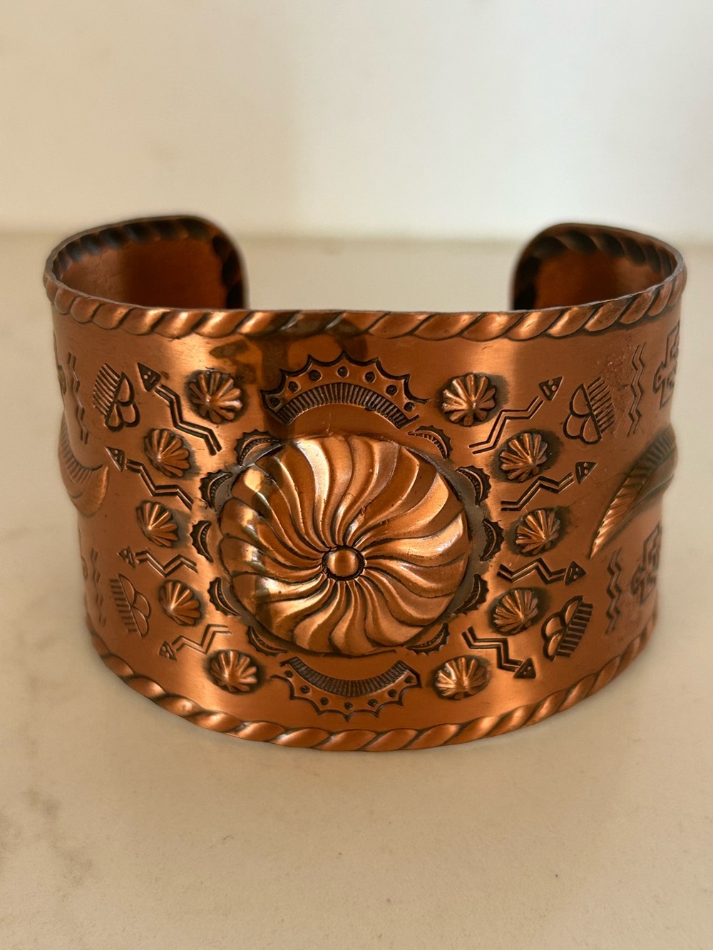 Vintage copper repoussé bracelet from mid-20th century Fred Harvey era